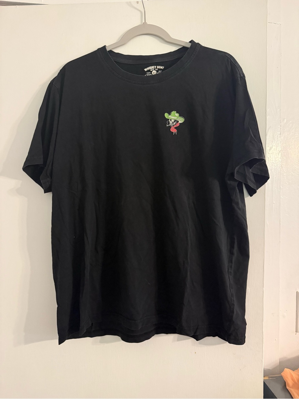Black Short-Sleeve Graphic Tee with Small Chest Logo